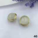 jpg17EGOLD CIRCLE WITH MILKY CRYSTAL STONE CENTER EAR RING