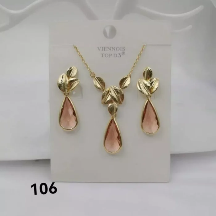 jpg22CEGOLD LEAVES WITH PINK CRYSTAL GLASS EARRINGCHAIN SET