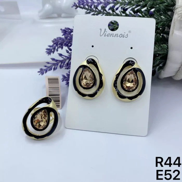 VIENNOIS RING WITH BLACK CERAMIC SPIRAL WITH GOLD STONE CENTER