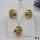 VIENNOIS GREEN STONE,WHITE PEARL,GOLD TISSUE AND STONES PENDANT AND EARRINGS CHAIN SET