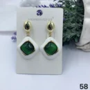 VIENNOIS GOLD WITH WHITE CERAMIC AND EMERALD CRYSTAL CENTER DROP EARRINGS