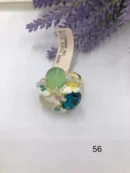 VIENNOIS RING WITH BLUE,GREEN,PEACH STONES WITH GOLD AND WHITE CERAMIC BUTTERFLIES