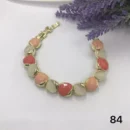 VIENNOIS PINK MILKY,WOMEN, JEWELRY, VIENNOIS, PEACH, PINK, GOLD, BRACELET PEACH STONES ENCASED IN GOLD BRACELET