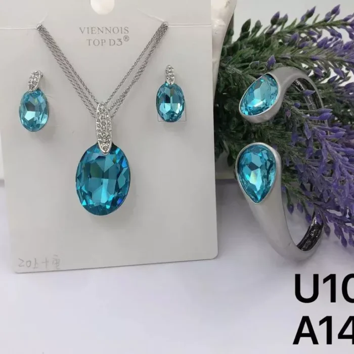 VIENNOIS SILVER CHAIN WITH OVAL SEA BLUE CRYSTAL STONE PENDANT WITH MATCHING EARRINGS SET