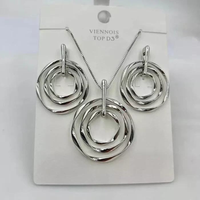 VIENNOIS SILVER TWIST STAGGERED RINGS EARRING CHAIN SET