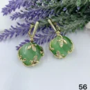 VIENNOIS GREEN CERAMIC WITH GOLD PETALS DETAILS AND GOLD PETAL PERFORATION DROP EARRING