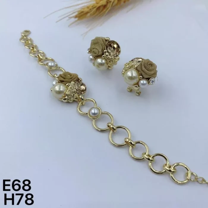 VIENNOIS GOLD RING LOOPS WITH WHITE AND BEIGE PEARLS, PINK STONE, BLACK BALL WITH STUDDS BRACELET