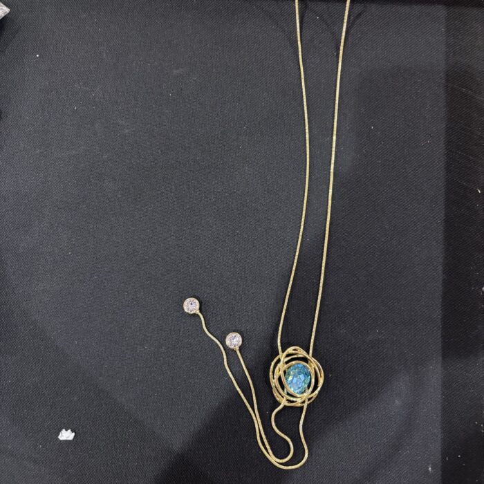 VIENNOIS LADIES GOLD CHAIN WITH SPIRAL LOOPS WITH SEA BLUE CUT STONE PENDANTS AND WHITE STONE TIPS